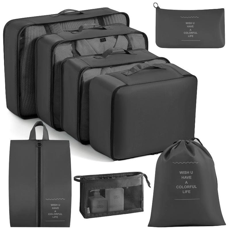 Achtdelige reisorganizer-set met packing cubes in verschillende maten voor in de koffer